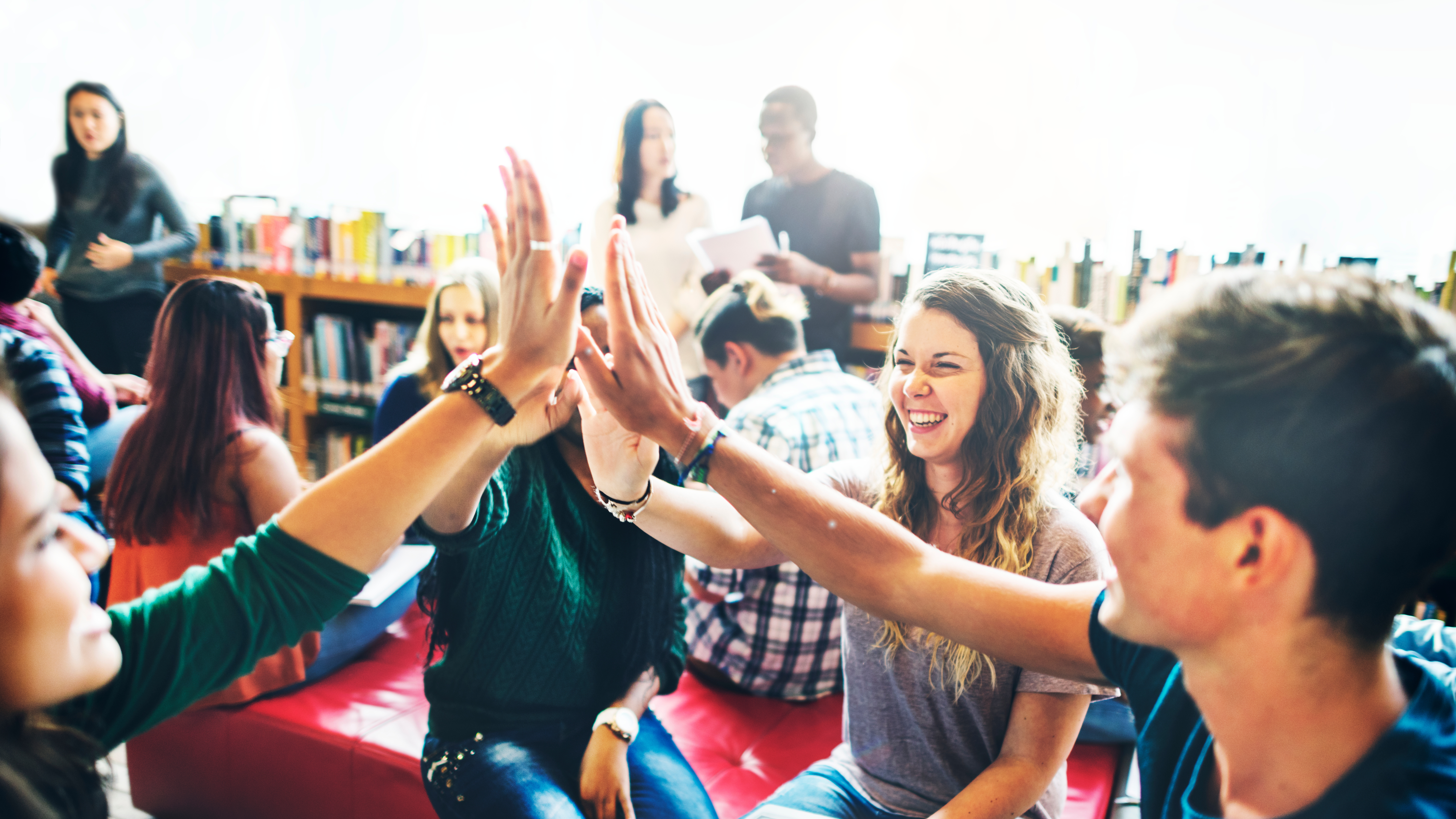 Teenagers high-five