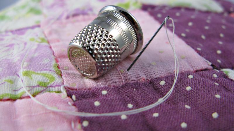 Quilt thimble sewing